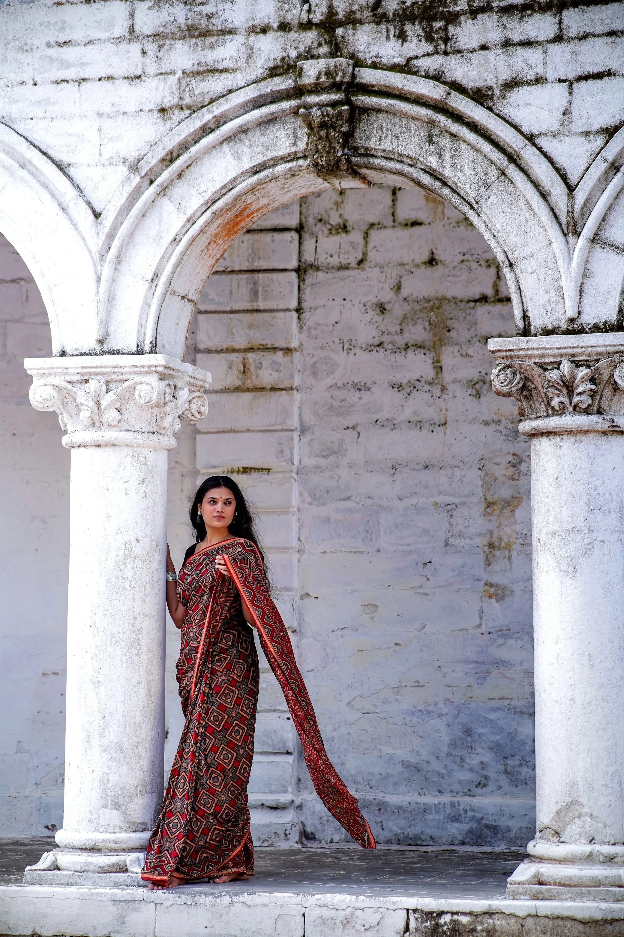 Jharokha - Red and black triangle red striped silk cotton Ajrakh handblockprinted saree