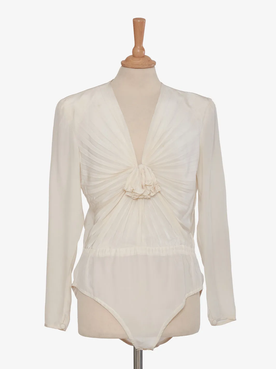 Juanita Sabbadini White silk bodysuit.