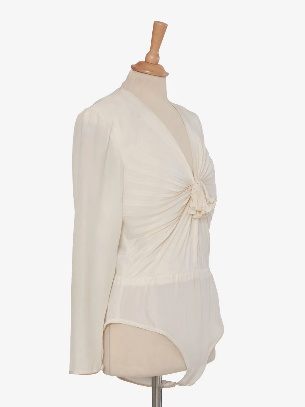 Juanita Sabbadini White silk bodysuit.