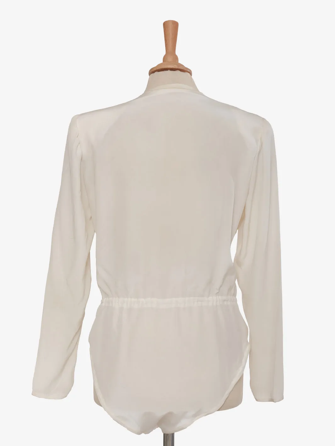 Juanita Sabbadini White silk bodysuit.