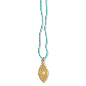 URSA NECKLACE IN GOLD ON TURQUOISE BEADS